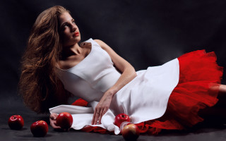 Woman white dress apples black - a black background behind her free wallpaper