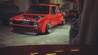 Red car garage junk tires - a garage next free wallpaper