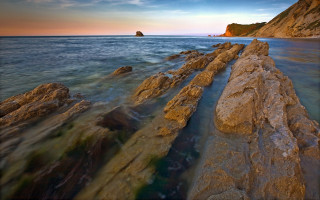 Rocky shore formation water city - a rocky shore free wallpaper for desktop