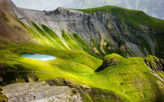 Mountain lake green mountain side - a green mountain free wallpaper