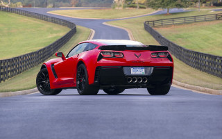 Red sports car road fence 2 - in the background free wallpaper