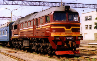 Train building tree sky cityscape - ue 5 free wallpaper