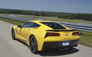 Yellow corvette road curve trees - free cars wallpaper