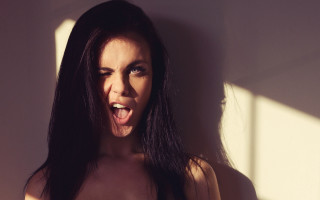 Funny face blowing hair tilted - facial muscle free wallpaper