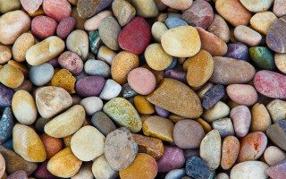 Multicolored rocks mosaic closeup traditional - a pile of rocks free wallpaper
