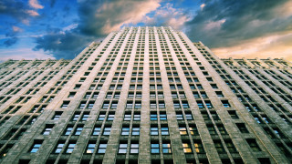 Tall building windows cloudy sky - front of it free wallpaper for desktop