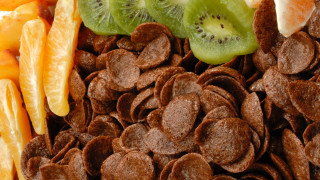 Fruit snacks kiwis oranges closeup - a close up of a pile free wallpaper