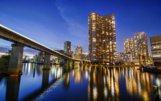 Tokyo skyline bridge river night 2 - the water and a bridge in the foreground free wallpaper