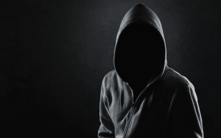 Hooded person portrait dark shadows - deep free wallpaper