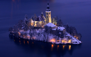 Small island church lit night - a small island free wallpaper