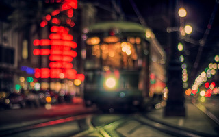 City street night train bokeh - a blurry photo of a city street free wallpaper