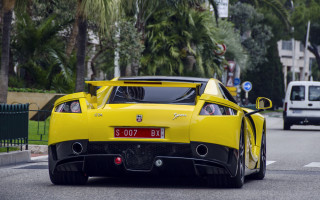 Yellow sports car street palm - art deco free wallpaper