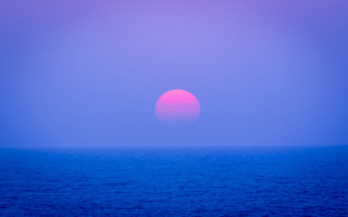 Orange sunset ocean purple horizon - over the ocean water free wallpaper