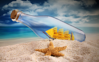 Starfish ship bottle beach sky - a starfish free wallpaper for desktop
