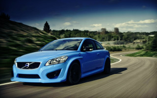 Blue car forest road cloudy - a blue car free wallpaper