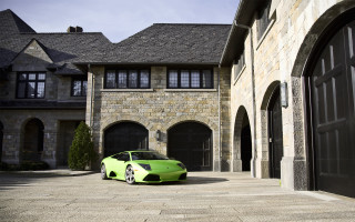 Green sports car house black - the side of the building free wallpaper for desktop