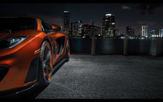 Sports car city skyline night - a sports car free wallpaper for desktop
