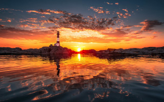 Lighthouse sunset reflection beach water - the waters edge free wallpaper for desktop