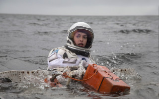 Space astronaut water beach planet - a woman in a space suit free wallpaper