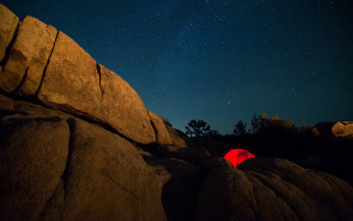 Tent rocky outcropping night sky - a tent free wallpaper