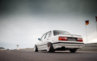 White car flag pole cloudy - a road next free wallpaper for desktop