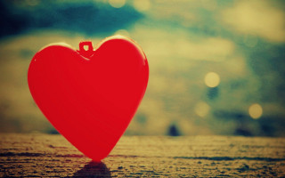 Red heart wooden table window - a red heart free wallpaper