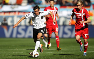 Soccer game stadium action blurry - a group of men playing free wallpaper