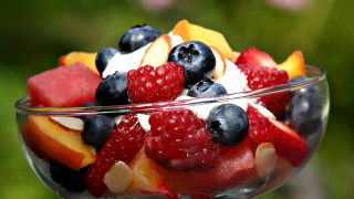 Fruit salad berries oranges blueberries - a table outside free wallpaper