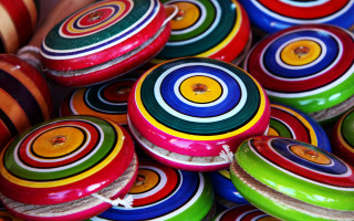 Colorful toy discs egyptian art - a pile free wallpaper