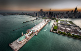 Large boat city skyline sunset - the water near a city skyline free wallpaper