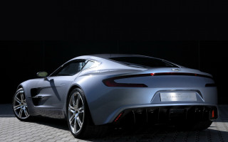 Silver sports car dark room 15 - a black wall free wallpaper