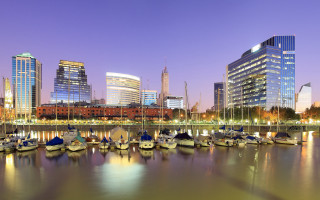 Harbor boats cityscape night lights 3 - a city skyline in the background free wallpaper
