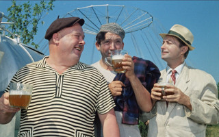 Three men drinking laughing outdoors - a ferris free wallpaper