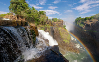 Rainbow waterfall nature sky cliff - a rainbow in the sky free wallpaper for desktop