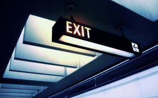 Exit sign hanging hallway institutional - institutional free wallpaper
