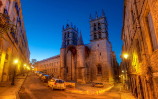 Romanesque street night cityscape tilt - a church in the background free wallpaper