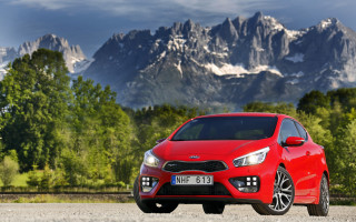 Red car mountain sky trees - viennese actionism free wallpaper