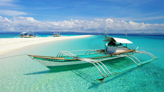 Beach boat ocean clouds saturated - top of a beach next free wallpaper for desktop