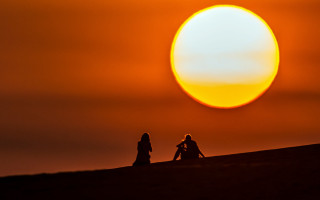 Hill sunset silhouette microscopic children - two person free wallpaper