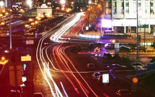 Futuristic city street traffic night - lot of traffic free wallpaper
