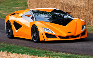 Orange sports car driving road 4 - nice looking orange sports car free wallpaper