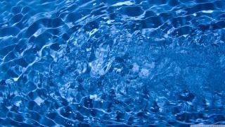 Blue water surface bubbles droplets - free rain wallpaper for desktop
