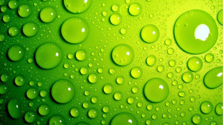 Green background water drops white - a close up free wallpaper for desktop