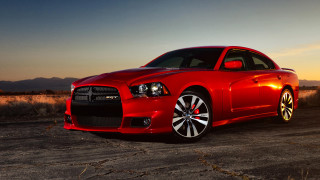 Red car sunset mountains cobra - the background and a sky line in the foreground free wallpaper