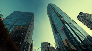 Tall buildings city street corner - traffic free wallpaper