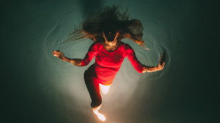 Woman floating water red shirt - elsa bleda free wallpaper for desktop