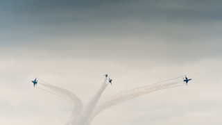Airplanes cloudy sky smoke trailing - behind them free wallpaper for desktop