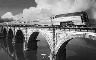 Train bridge water cloudy sky - a bridge over water free wallpaper