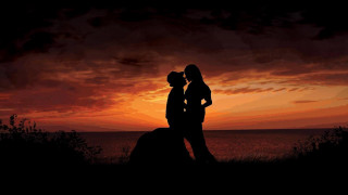 Couple people ocean sunset red - a red sky free wallpaper for desktop