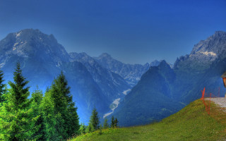 Mountain hut forest lake sky - a scenic view of a mountain range free wallpaper